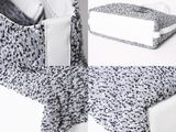 a picture of a pair of socks and a tie on a table