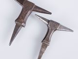 pair of antique hammers on a white background