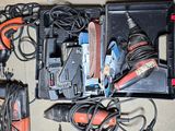 a lot of tools that are laying out on the floor