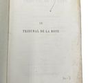 a book open with a handwritten title on it