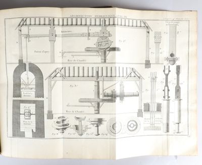 an old book with a drawing of a machine on it