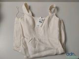 a white top with a hoodie on a hanger