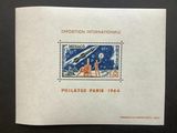 a stamp with an image of a man and a dog on it