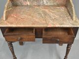 a marble top desk with two drawers underneath it