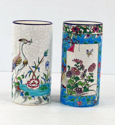 LONGWY, réunion de deux VASES rouleaux, l'un à décor de Héro…