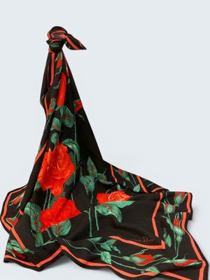 a black scarf with a red rose on it
