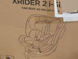 cardboard box with a picture of a child ' s car seat on top of it