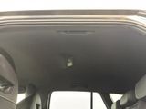 a view of the inside of a car with the door open