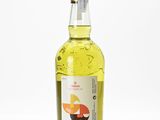 an image of a bottle of alcohol sitting on top of a table