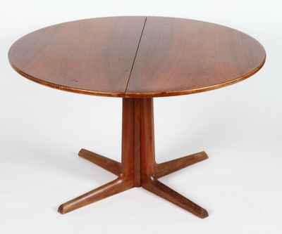an image of a wooden table with two leaves on it