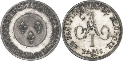 an image of a silver coin with the letter a on it