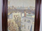 tableau encadré représentant une vue de ville avec des bâtiments et des arbres