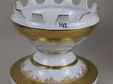 an image of a white and gold bowl with a gold rim