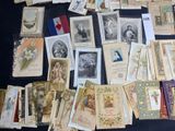 many cards and postcards on the table together