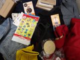 a pile of clothing and other items on the floor