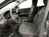 the interior of a car with a steering wheel and a dashboard