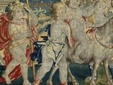 a tapestry with a picture of a group of people riding on horses