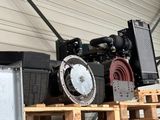 many different types of machinery sitting on a pallet