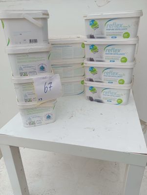 a stack of plastic containers sitting on a white table