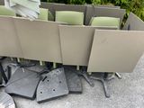 a lot of chairs and tables that have been knocked over
