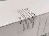 a close up of a white box with a label on it
