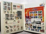 an open book with stamps and pictures on it