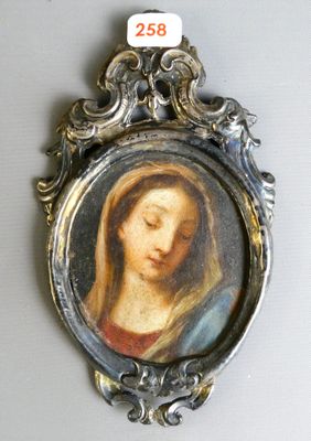 an image of a picture of a woman in a frame on a wall