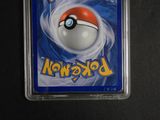 a close up of a pokemon card with a red and white ball