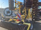 an image of a tractor that is parked in the parking lot