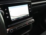 a picture of a car dashboard with a gps device in it
