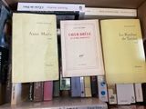 many books that are sitting in a box together