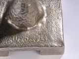 a metal object that is sitting on top of a table
