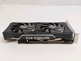 a close up of a video card on a white surface