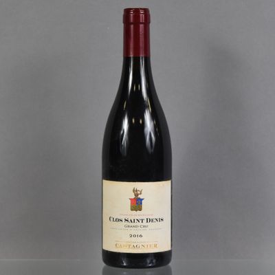 a bottle of wine that is sitting on a table