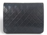 chanel black quilted lambskin flap clutch bag