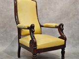 an old chair with yellow upholstered upholstered upholstered upholstered upholstered up