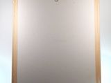 an easel with a blank canvas on it on a white background
