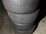 tires stacked on top of each other in a garage
