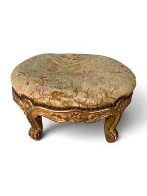 an image of a foot stool made of wood and fabric