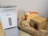 a coffee maker and a box sitting on a table
