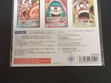 three cards in the package on the table
