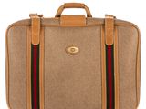 an image of a brown briefcase with a red and green stripe on the side