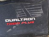 a close up of a car floor mat with a logo on it