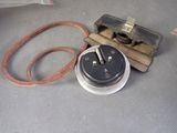 an old electrical plug and a cord on the floor