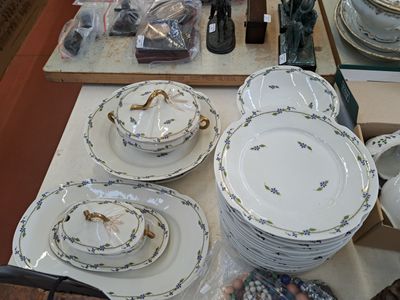 a table with a lot of plates and bowls on it
