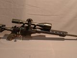 an image of a rifle with a scope on it