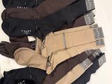 several pairs of men ' s socks are laid out on a table