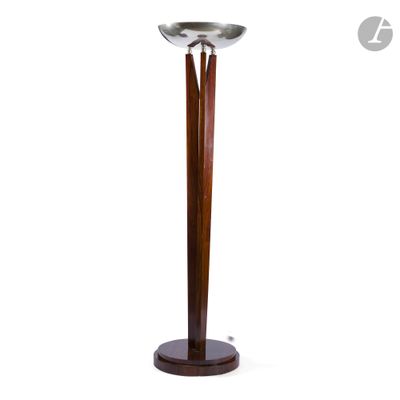 an image of a tall wooden and metal candle holder on a white background
