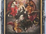 an image of a painting of jesus is hanging on a wall