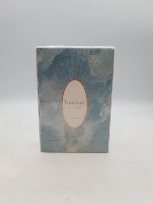 an image of a box of perfume sitting on a white surface